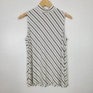 Chico's sleeveless top size 1 medium. mock neck, white stripes